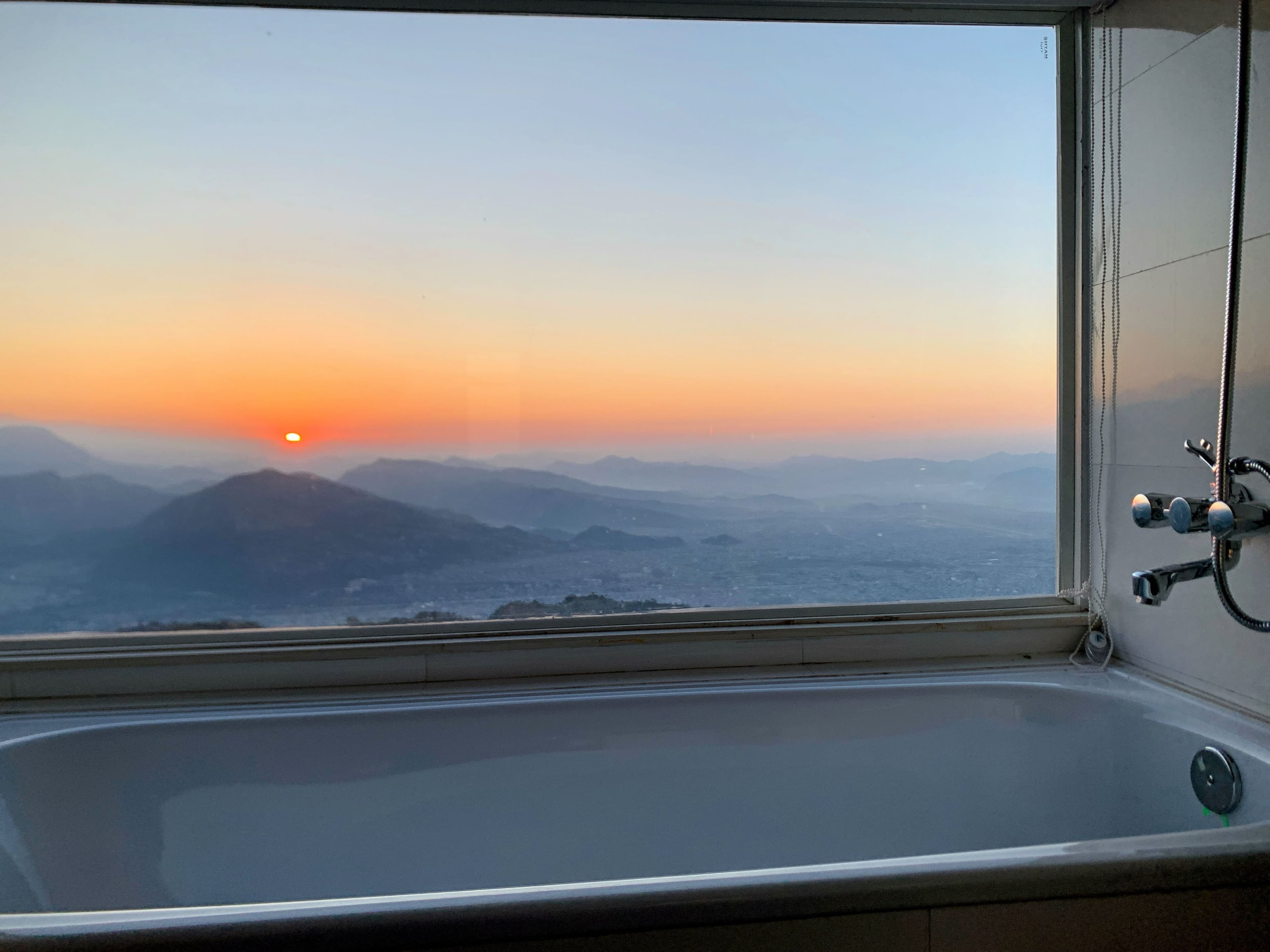 sunrise from bathtub